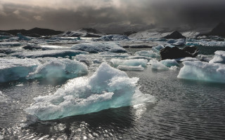 Icebergs cloudy day matte painting - a group of icebergs free wallpaper