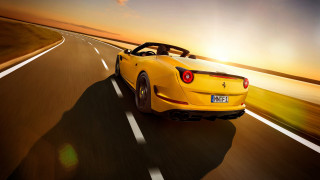 Yellow sports car backlit sunset 2 - the sun free wallpaper