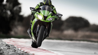Rider green motorcycle race track - a person riding free wallpaper