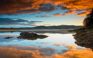 Lake rock sunset clouds mooring - rich moody colours free wallpaper