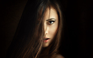 Woman long hair serious portrait - serious free wallpaper for desktop