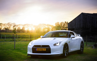 White sports car field barn 2 - a white sports car free wallpaper