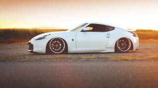 White sports car sunset gravel - clean line free wallpaper
