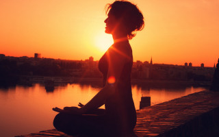 Woman dock sunset cityscape backlighting - a dock in front free wallpaper