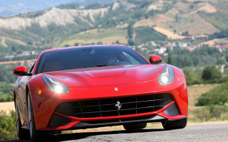 Red ferrari mountains town sunny - the mountain free wallpaper