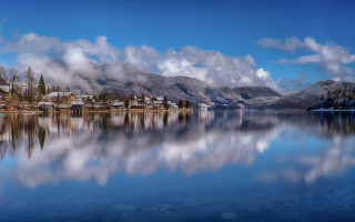 Lake mountain town clouds reflections - a town free wallpaper
