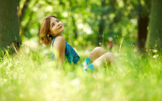 Woman sitting grass park sky - a park free wallpaper