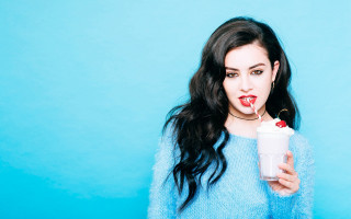 Woman drinking cherry cup blue - a cup free wallpaper