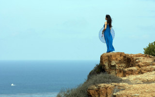 Woman blue dress cliff ocean - bracha l. ettinger free wallpaper