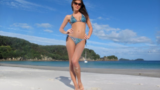 Beach woman sailing blue sky - near free wallpaper