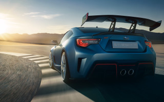 Blue sports car surfboard sunset - a blue sports car free wallpaper