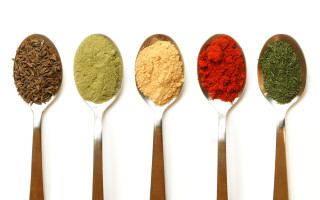 Five spoons spices white background - a white background behind them free wallpaper