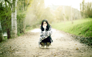 Woman plaid coat woods outstretched - plaid free wallpaper