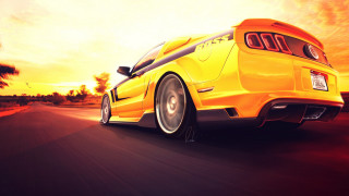 Yellow car sunset mountain ocean - the cloud free wallpaper