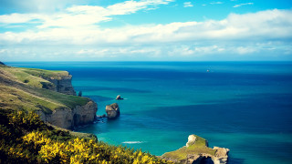 Scenic water cliffs clouds beach - scenic free wallpaper