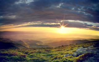Sunset mountain valley clouds lights - a beautiful sunset over a mountain range free wallpaper