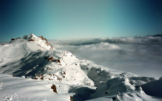 Snowy mountain sky clouds snowboard 2 - a snowboard free wallpaper