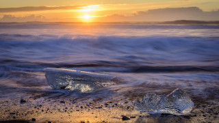 Plastic bottle beach sunset ocean - plastic free wallpaper