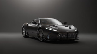 Black sports car studio rendering 2 - a black background and a spotlight free wallpaper