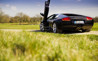 Black sports car door open - its door open free wallpaper