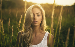 Blonde woman field blowing hair 2 - tall grass free wallpaper for desktop