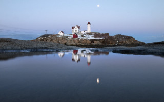 Lighthouse rocky shore fullmoon water - bascove free wallpaper