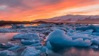 Sunset water ice mountains pink - ice chunk free wallpaper