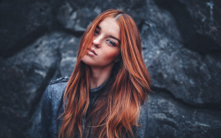 Red haired woman forest winter - a rock wall free wallpaper