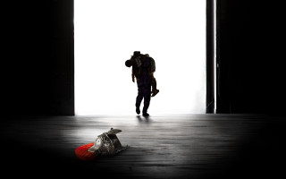 Person walking dark room backpack - a backpack free wallpaper