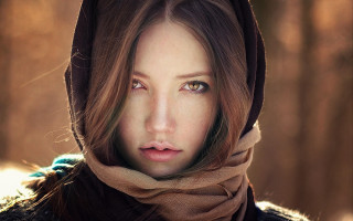Woman scarf hood serious look - shaded free wallpaper