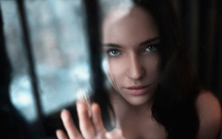 Woman looking through window long - her chest free wallpaper