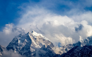 Mountain range clouds plane sky 2 - free winter wallpaper