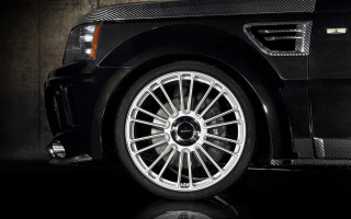 Black car chrome rim reflection - a reflection of the car free wallpaper