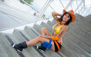 Woman yellow top black shorts 2 - a yellow top free wallpaper