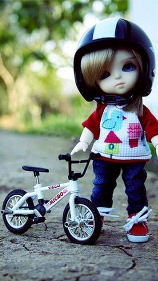 Doll riding bike helmet red - a helmet free wallpaper for mobile