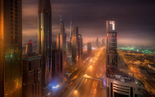 Afrofuturism cityscape bridge tower sunset - the background and a street light in the foreground free wallpaper