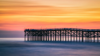 Pier lighthouse sunset ocean colorful - a light house free wallpaper