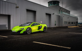 Green sports car hangar cloudy - a cloudy day free wallpaper for desktop
