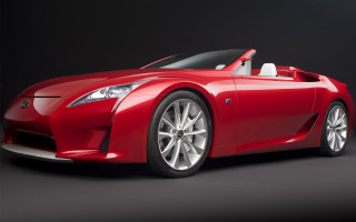 Red sports car studio shot - a studio free wallpaper