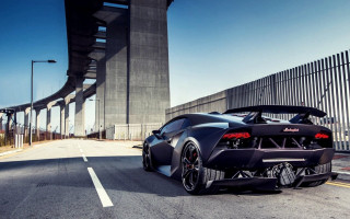 Black sports car bridge tall - a tall building free wallpaper