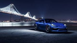 Blue sports car night bridge - a blue sports car free wallpaper