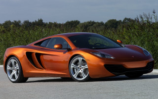 Orange sports car forest nature - a orange sports car free wallpaper
