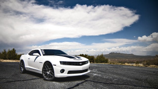 White sports car cloudy sky 4 - a white sports car free wallpaper