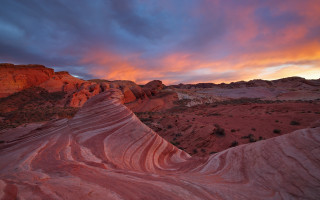 Desert sunset rock formation orange - a desert landscape free wallpaper