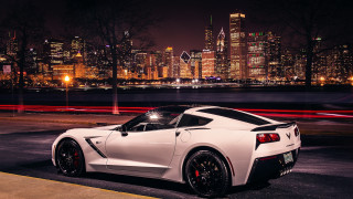 White sports car city skyline 7 - the building free wallpaper
