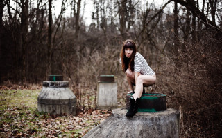 Woman striped shirt boots forest - tree and bushes behind her free wallpaper