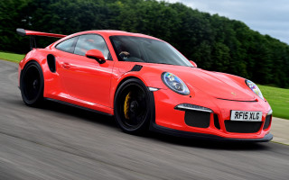 Red porsche sports car driving - the background and a sky background free wallpaper for desktop