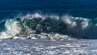 Wave surfing ocean sunny beach - a large wave free wallpaper for desktop