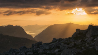 Mountain range sunset clouds water - david paton free wallpaper