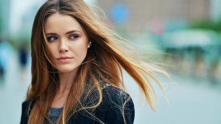 Woman long hair street blurry - flowing free wallpaper